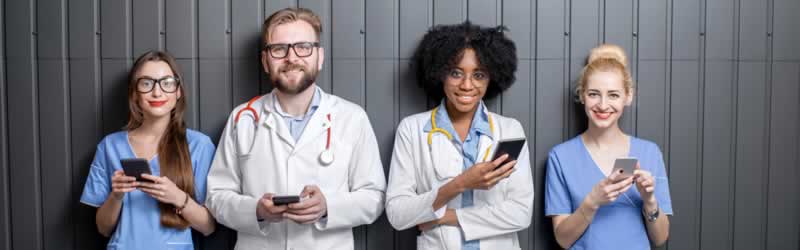 doctors and nurses using mobile devices